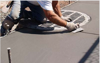 Person laying cement